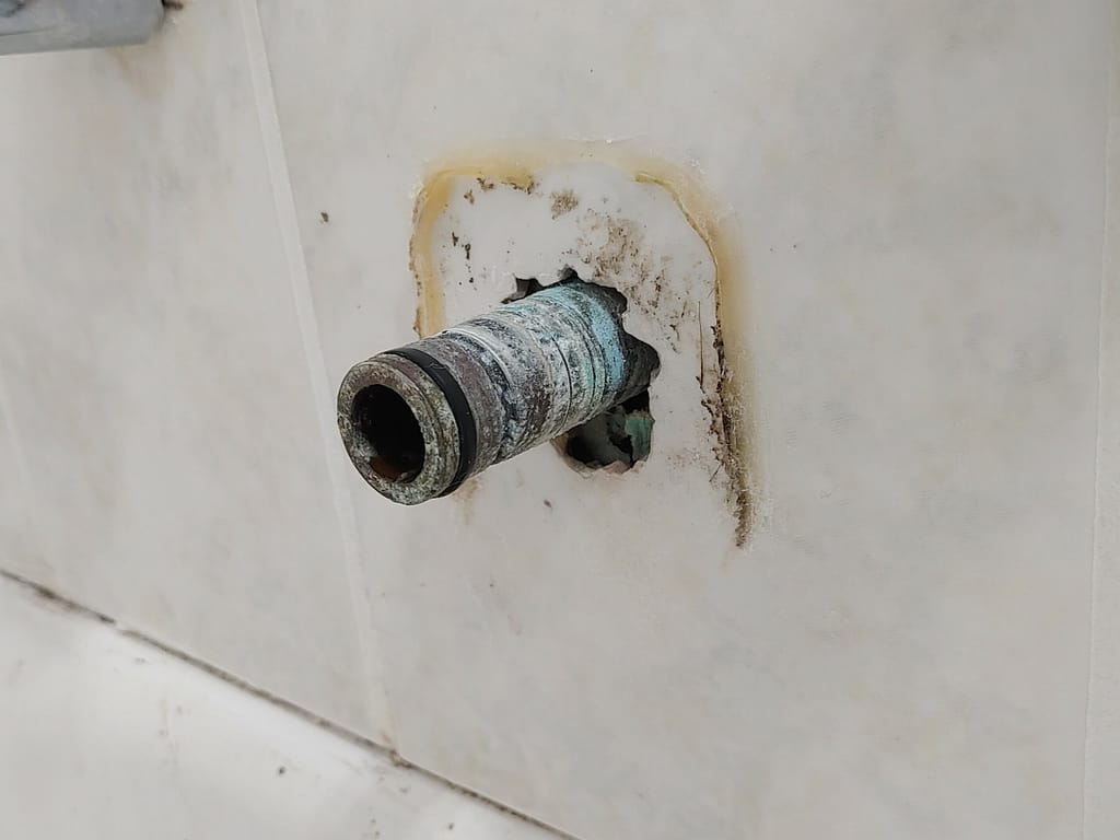 Tub Spout Leaking From Back? Why It Happens & How to Fix It