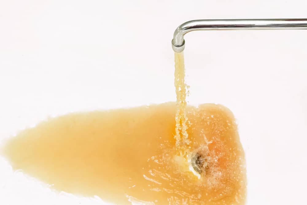 Yellow Water in Bathtub: Causes & 5 Quick Fixes